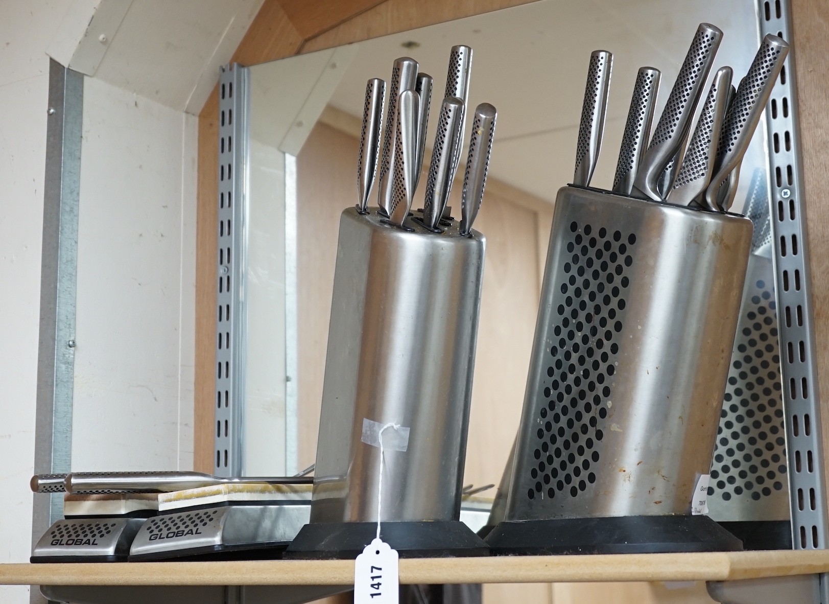 Two stainless steel blocks of assorted Global kitchen knives, two carving forks